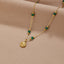 Nerissa Gouden Shell & Green Bead Ketting