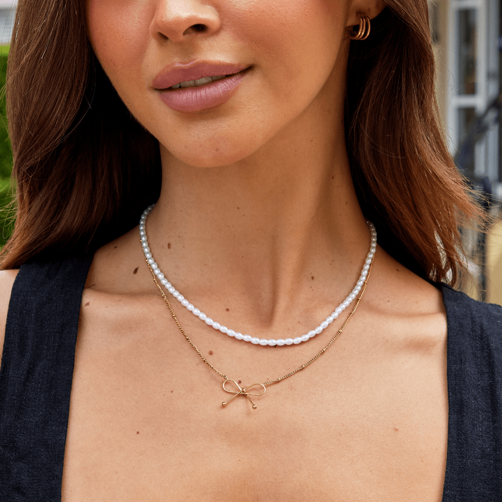 Anika Gouden Bow Ketting Secundaire afbeelding