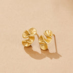 Gouden Spiral Drop Oorbellen
