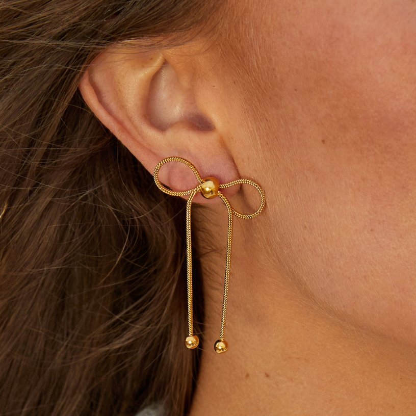 Gouden Katie Strik Oorbellen Secundaire afbeelding