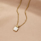 Lucia Witte Schelp Hanger Ketting