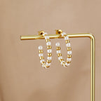Maia Parel & Gouden Bead Oorbellen