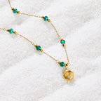 Nerissa Gouden Shell & Green Bead Ketting