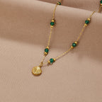 Nerissa Gouden Shell & Green Bead Ketting